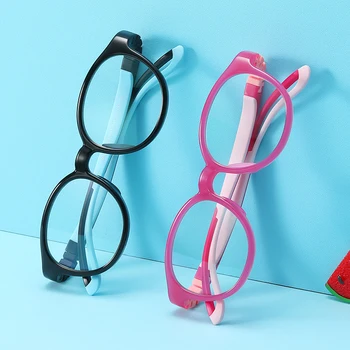 Nauja vaikų anti-mėlyna akinius berniukų ir mergaičių apvalus rėmo plokščio veidrodžio atminties silikono šventyklos akinių rėmeliai AE0960